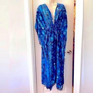 Blue Island Beach Sheer Coverup in a floral blue print one size